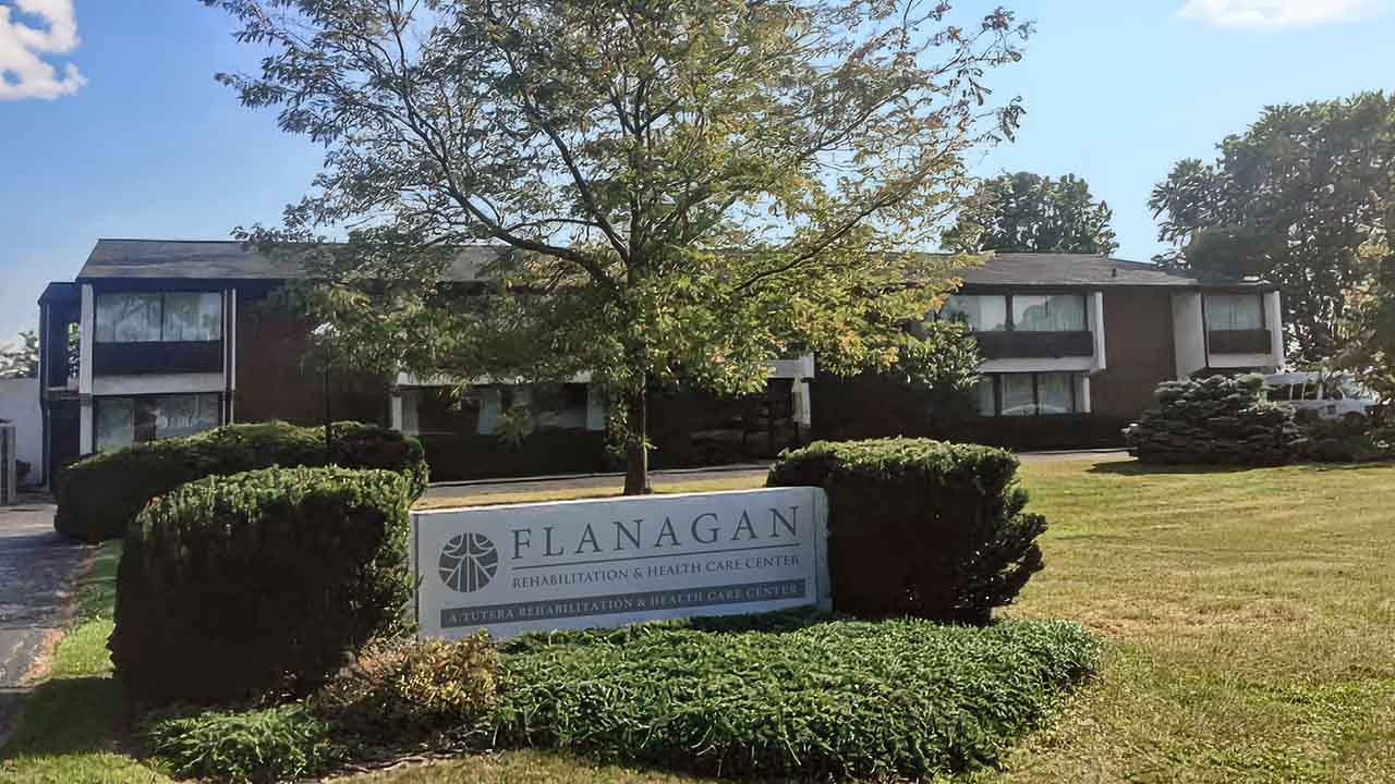 Two-story brick skilled nursing and rehab building at Flanagan Rehabilitation in Flanagan, IL, Livingston County.