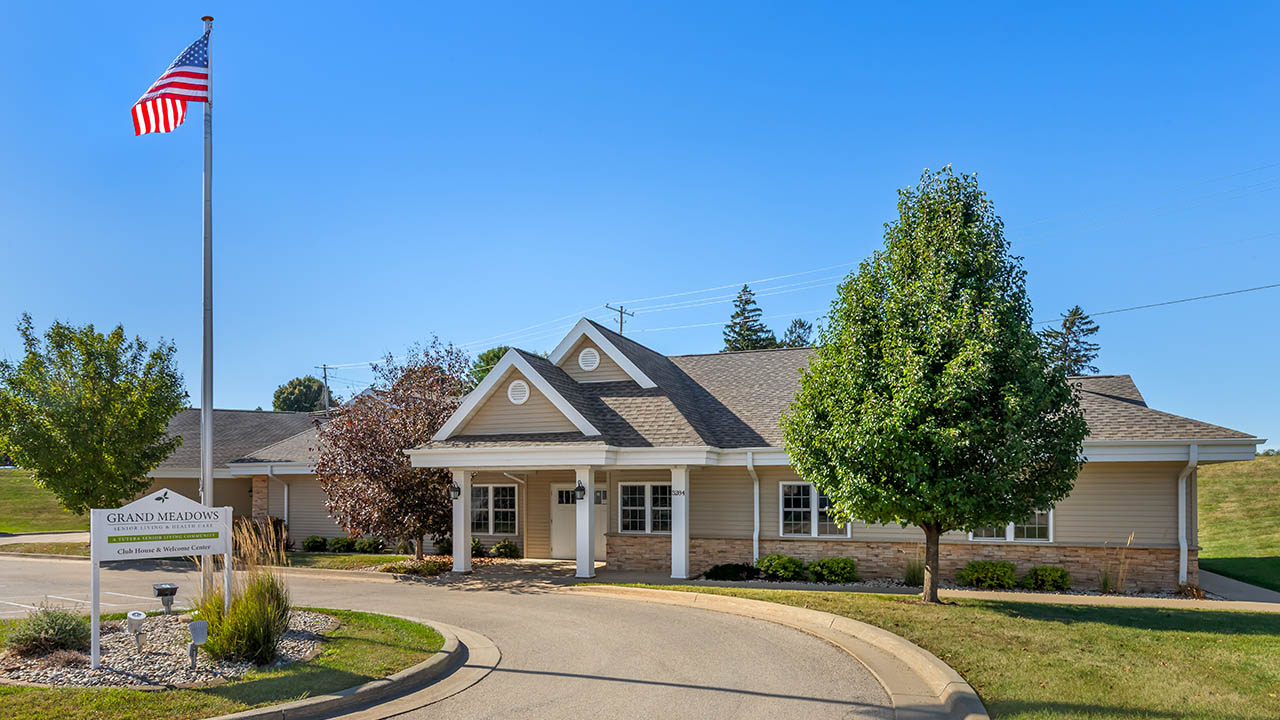 Professional rehab community with a modern facade and gabled roof at Grand Meadows Rehabilitation &amp; Health Care Center in Asbury, IA, Dubuque County.