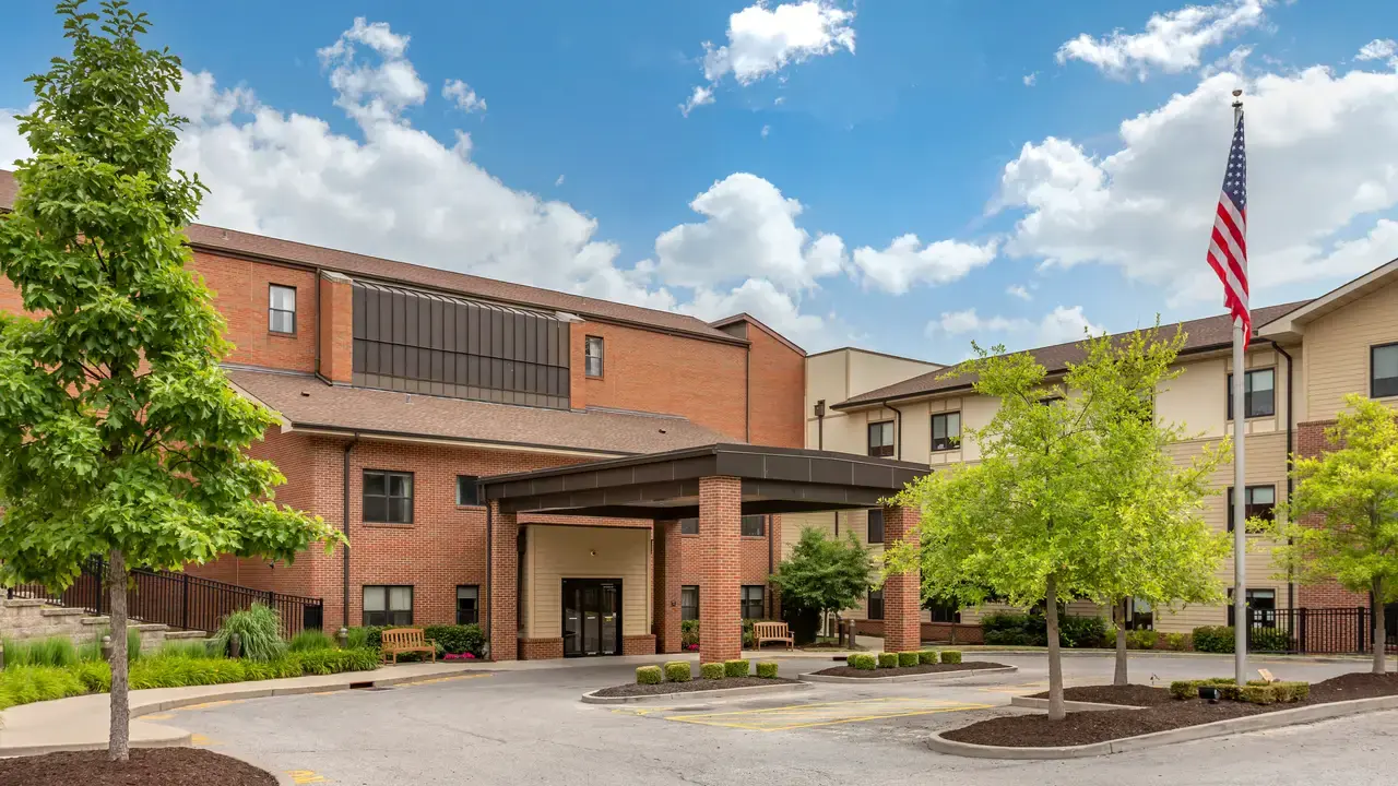 Two-story brick building with a covered entrance at St. Paul’s Rehabilitation &amp; Health Care in Belleville, IL, St. Clair County.