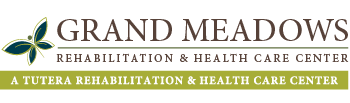 Logo of Grand Meadows Rehabilitation & Health Care Center, featuring a green and blue butterfly design on the left, and the text 