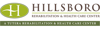 Logo of Hillsboro Rehabilitation & Health Care Center with a green oval shape on the left featuring a white 