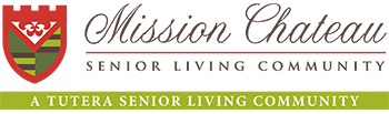 Logo for Mission Chateau Senior Living Community, with a shield-like emblem on the left. Below the text is a green banner stating 