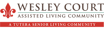 Logo for Wesley Court Assisted Living Community. Featuring brown and teal text with a red banner at the bottom.